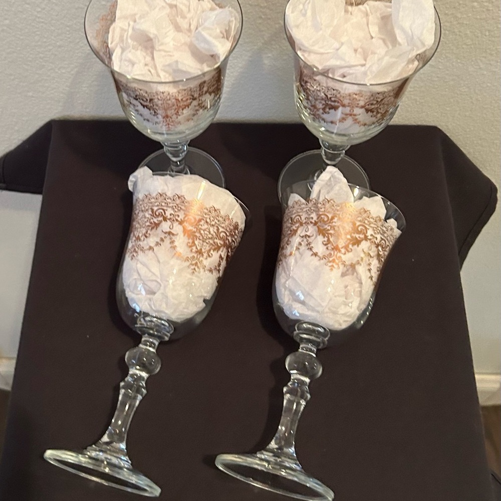Set of 4 Vintage gold decorated wine glasses.
